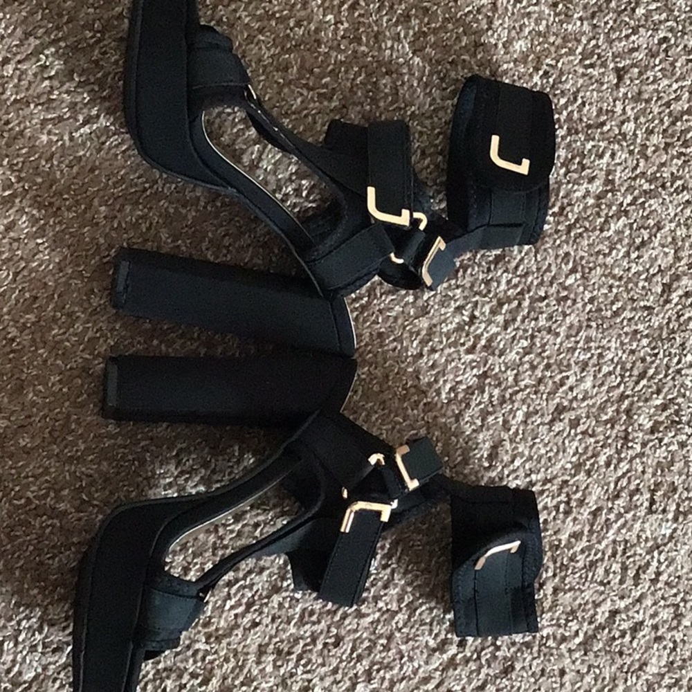 Black ankle high heels